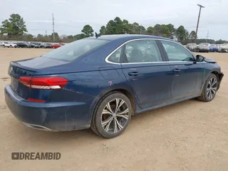 2021 Volkswagen Passat SE z VIN 1VWSA7A37MC009030, wystawiony jako IAAI lot #41172489 z przebiegiem 70 100 mil mil oraz . Historia ofert i sprzedaży dostępna na DreamBid. Obrazek 4.
