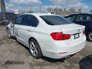 2015 BMW 3 Series 328i with VIN WBA3C1C5XFK117788, listed as a IAAI auction lot 41752178 with 154,030 mi miles and . Bid and sale history available at carsss.com. Image 3.