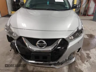 2016 Nissan Maxima SL with VIN 1N4AA6AP6GC384851, listed as a IAAI auction lot 41663659 with 127,247 mi miles and . Bid and sale history available at DreamBid. Image 12.