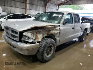 2000 Dodge Dakota Sport with VIN 1B7GL2AN1YS712433, listed as a Copart auction lot 61025395 with 211,801 mi miles and Salvage title. Bid and sale history available at DreamBid. Image 1.