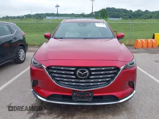 2021 Mazda CX-9 Signature with VIN JM3TCBEY9M0511928, listed as a IAAI auction lot 42231925 with 26,367 mi miles and . Bid and sale history available at DreamBid. Image 12.