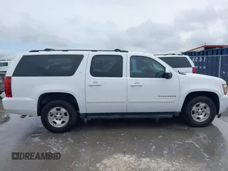 2012 Chevrolet Suburban LT with VIN 1GNSCJE00CR165813, listed as a IAAI auction lot 42494042 with 205,998 mi miles and . Bid and sale history available at DreamBid. Image 13.