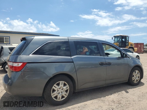 2011 Honda Odyssey LX с VIN 5FNRL5H24BB036764, выставлен на аукционе Copart как лот 59046385 с пробегом 130 182 миль миль и Чистый • Clean title. История ставок и продаж доступна на DreamBid. Изображение 3.