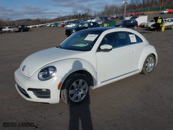2019 Volkswagen Beetle SE with VIN 3VWJD7AT6KM713525, listed as a IAAI auction lot 41508195 with 73,360 mi miles. Bid and sale history available at carsss.com. Image 2.