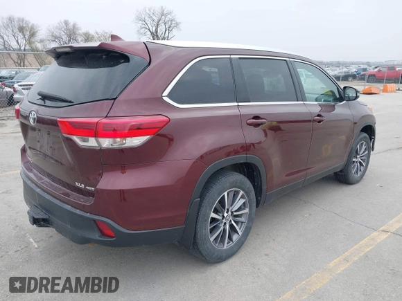 2019 Toyota Highlander SE with VIN 5TDJZRFH8KS993713, listed as a IAAI auction lot 42021246 with 122,078 mi miles and . Bid and sale history available at DreamBid. Image 4.