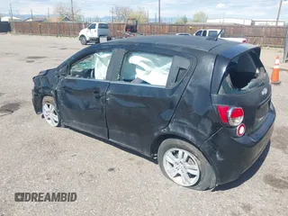 2012 Chevrolet Sonic LT with VIN 1G1JC6SB9C4200197, listed as a IAAI auction lot 42085421 with 124,667 mi miles. Bid and sale history available at carsss.com. Image 3.