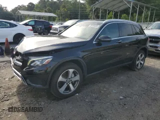 2018 Mercedes-Benz GLC 300 with VIN WDC0G4JB9JV079296, listed as a Copart auction lot 58169385 with 105,474 mi miles and Salvage title. Bid and sale history available at DreamBid. Image 1.