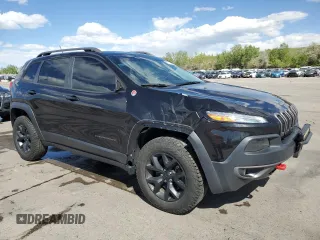 2014 Jeep Cherokee Trailhawk z VIN 1C4PJMBS1EW239692, wystawiony jako Copart lot #57153065 z przebiegiem 111 899 mil mil oraz Szkoda całkowita • Salvage title. Historia ofert i sprzedaży dostępna na DreamBid. Obrazek 4.