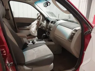 2010 Mercury Mariner Premier with VIN 4M2CN9H74AKJ02146, listed as a IAAI auction lot 42274161 with 195,275 mi miles and . Bid and sale history available at DreamBid. Image 5.