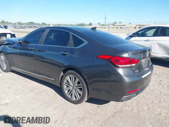 2018 Genesis G80 3.8L z VIN KMHGN4JE7JU226740, wystawiony jako IAAI lot #41821284 z przebiegiem 87 081 mil mil oraz . Historia ofert i sprzedaży dostępna na DreamBid. Obrazek 3.