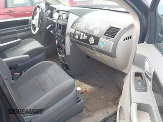 2010 Dodge Grand Caravan SXT with VIN 2D4RN5D13AR427353, listed as a IAAI auction lot 42180594 with 191,535 mi miles and . Bid and sale history available at DreamBid. Image 5.