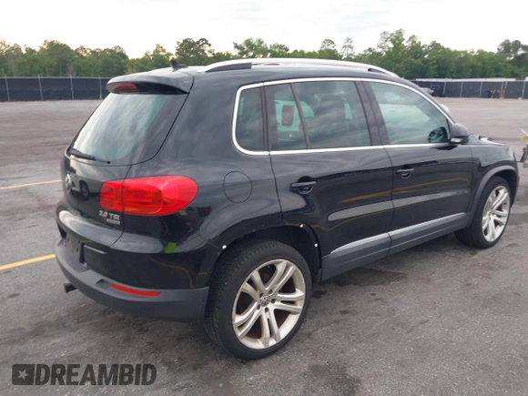 2012 Volkswagen Tiguan S with VIN WVGBV7AX6CW592242, listed as a IAAI auction lot 42215240 with 158,852 mi miles and . Bid and sale history available at DreamBid. Image 4.