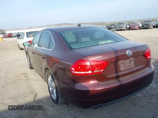 2013 Volkswagen Passat SE w/Sunroof with VIN 1VWBH7A35DC150285, listed as a IAAI auction lot 38970420 with 160,374 mi miles. Bid and sale history available at carsss.com. Image 3.
