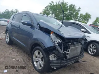 2012 Kia Sportage LX with VIN KNDPBCA2XC7317600, listed as a IAAI auction lot 42433336 with 112,838 mi miles and . Bid and sale history available at DreamBid. Image 1.