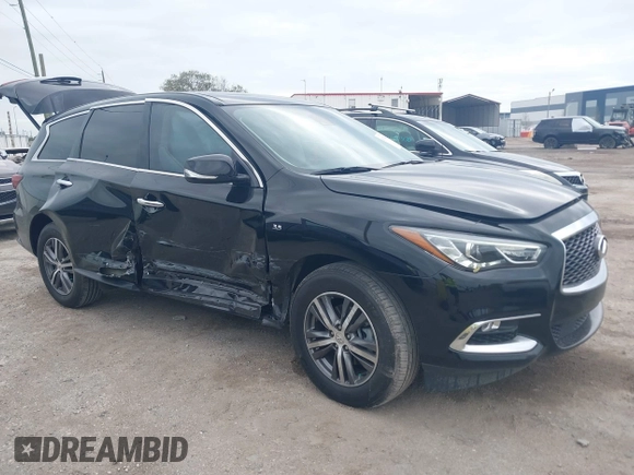 2020 Infiniti QX60 Pure with VIN 5N1DL0MN0LC527050, listed as a IAAI auction lot 41734032 with 71,204 mi miles and . Bid and sale history available at DreamBid. Image 1.