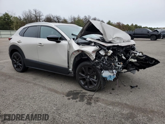 2022 Mazda CX-30 2.5 Turbo with VIN 3MVDMBAY1NM434761, listed as a Copart auction lot 72731244 with 30,331 mi miles and Salvage Title. Bid and sale history available at DreamBid. Image 4.