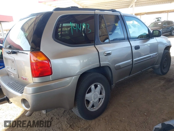 2003 GMC Envoy SLT with VIN 1GKDS13S732346641, listed as a IAAI auction lot 42111222 with 291,231 mi miles and . Bid and sale history available at DreamBid. Image 4.