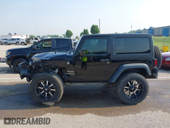 2017 Jeep Wrangler Sport with VIN 1C4AJWAG6HL654592, listed as a IAAI auction lot 42447379 with 61,585 mi miles and . Bid and sale history available at DreamBid. Image 14.