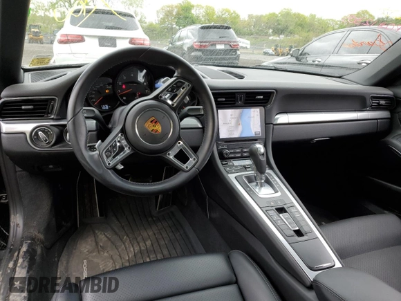 2018 Porsche 911 Carrera z VIN WP0AA2A93JS106166, wystawiony jako Copart lot #51105893 z przebiegiem 11 476 mil mil oraz . Historia ofert i sprzedaży dostępna na DreamBid. Obrazek 8.