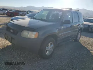 2002 Ford Escape XLS Choice with VIN 1FMYU021X2KC77142, listed as a Copart auction lot 77036384 with 213,292 mi miles and Clean title. Bid and sale history available at DreamBid. Image 1.