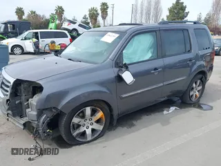 2015 Honda Pilot Touring with VIN 5FNYF3H91FB011847, listed as a IAAI auction lot 41841293 with 99,431 mi miles. Bid and sale history available at carsss.com. Image 18.