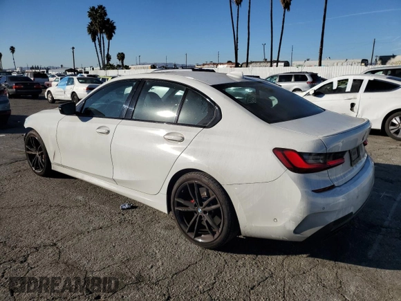 2022 BMW 3 Series M340i with VIN 3MW5U7J05N8C58784, listed as a Copart auction lot 82155364 with 23,376 mi miles and Salvage Title. Bid and sale history available at carsss.com. Image 2.