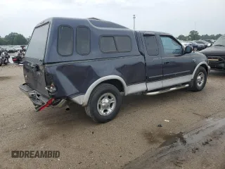 2000 Ford F-150 XL with VIN 1FTRX17L7YNC24292, listed as a Copart auction lot 58852925 with 213,318 mi miles and Salvage title. Bid and sale history available at DreamBid. Image 3.