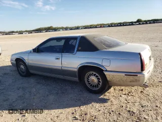 2000 Cadillac Eldorado Touring with VIN 1G6ET1295YU145248, listed as a Copart auction lot 82160574 with 87,294 mi miles and Salvage Title. Bid and sale history available at DreamBid. Image 2.