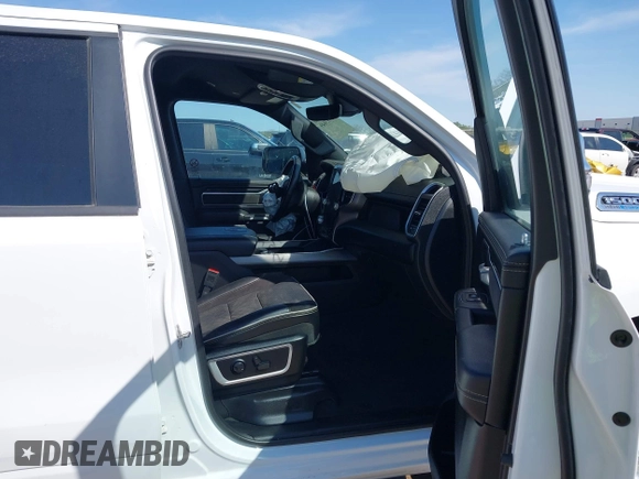2023 Ram 1500 Laramie with VIN 1C6SRFJT0PN508550, listed as a IAAI auction lot 41913849 with 57,765 mi miles and . Bid and sale history available at DreamBid. Image 5.