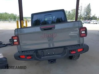 2022 Jeep Gladiator Rubicon with VIN 1C6JJTBG6NL166081, listed as a IAAI auction lot 42204431 with 40,568 mi miles and . Bid and sale history available at DreamBid. Image 17.
