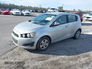 2015 Chevrolet Sonic LS with VIN 1G1JA6SH9F4128237, listed as a IAAI auction lot 41383896 with 215,524 mi miles and . Bid and sale history available at DreamBid. Image 2.