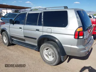 2001 Mitsubishi Montero ES z VIN JA4LS21HX1P041052, wystawiony jako IAAI lot #42084599 z przebiegiem 239 095 mil mil oraz . Historia ofert i sprzedaży dostępna na DreamBid. Obrazek 3.