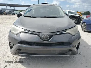 2018 Toyota RAV4 XLE with VIN 2T3WFREV0JW409386, listed as a Copart auction lot 53428615 with 91,999 mi miles and Salvage Title. Bid and sale history available at carsss.com. Image 5.