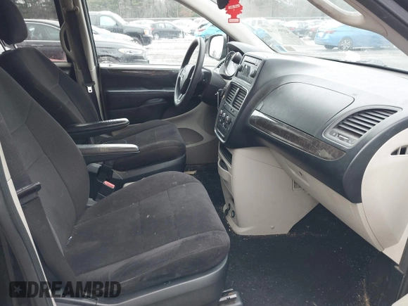 2011 Dodge Grand Caravan SXT with VIN 2D4RN4DG0BR603470, listed as a IAAI auction lot 40998148 with 82,968 mi miles and . Bid and sale history available at DreamBid. Image 5.