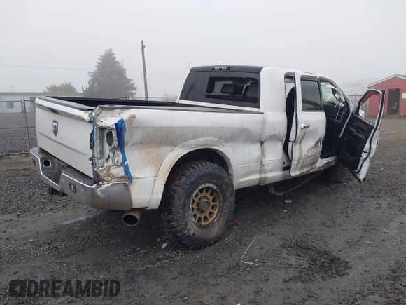 2016 Ram 2500 Laramie with VIN 3C6UR5NL2GG287071, listed as a IAAI auction lot 40989387 with 104,781 mi miles and . Bid and sale history available at DreamBid. Image 4.