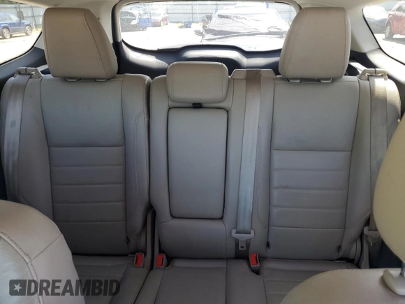 2015 Ford Escape Titanium with VIN 1FMCU9J92FUC74879, listed as a Copart auction lot 54683185 with 143,436 mi miles and Salvage title. Bid and sale history available at DreamBid. Image 10.
