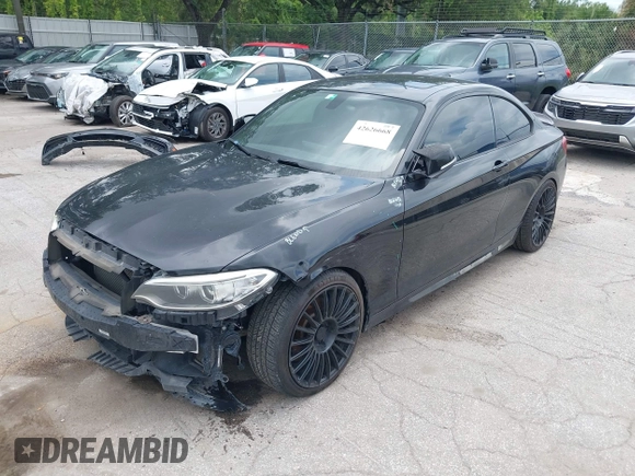 2015 BMW 2 Series M235i with VIN WBA1J7C5XFV289284, listed as a IAAI auction lot 42626668 with 179,944 mi miles and . Bid and sale history available at DreamBid. Image 2.