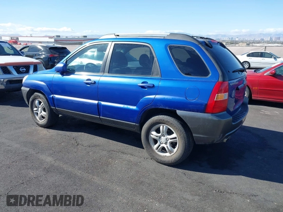 2005 Kia Sportage LX with VIN KNDJF723457057402, listed as a IAAI auction lot 41471742 with 215,565 mi miles and . Bid and sale history available at carsss.com. Image 3.