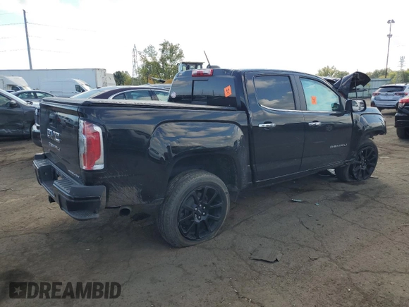 2022 GMC Canyon 4WD Denali with VIN 1GTG6EEN1N1130725, listed as a Copart auction lot 74003444 with 37,448 mi miles and Salvage Title. Bid and sale history available at carsss.com. Image 3.