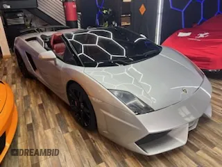 2013 Lamborghini Gallardo z VIN ZHWGU6BZ7DLA12511, wystawiony jako Copart lot #85780924 z przebiegiem 35 386 mil mil oraz Szkody całkowita. Historia ofert i sprzedaży dostępna na DreamBid. Obrazek 2.