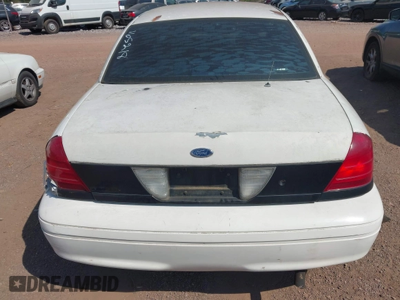 2001 Ford Crown Victoria Police Interceptor z VIN 2FAFP71W21X165218, wystawiony jako IAAI lot #42062199 z przebiegiem 233 978 mil mil oraz . Historia ofert i sprzedaży dostępna na DreamBid. Obrazek 17.