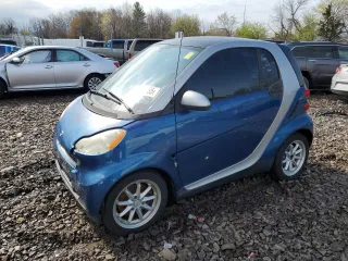2008 Smart fortwo Pure z VIN WMEEJ31X08K095175, wystawiony jako Copart lot #52931165 z przebiegiem 102 299 mil mil oraz Szkody całkowita. Historia ofert i sprzedaży dostępna na DreamBid. Obrazek 1.