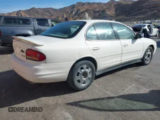 2001 Oldsmobile Intrigue GX z VIN 1G3WH52H11F140740, wystawiony jako IAAI lot #40799284 z przebiegiem 131 940 mil mil oraz . Historia ofert i sprzedaży dostępna na DreamBid. Obrazek 4.