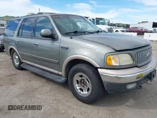 1999 Ford Expedition XLT z VIN 1FMPU18L3XLB21018, wystawiony jako IAAI lot #42003908 z przebiegiem Nie podano mil oraz . Historia ofert i sprzedaży dostępna na DreamBid. Obrazek 1.