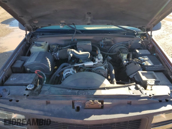 1997 GMC Yukon with VIN 1GKEK13R0VJ710179, listed as a Copart auction lot 81374234 with 186,257 mi miles and Salvage Title. Bid and sale history available at carsss.com. Image 13.