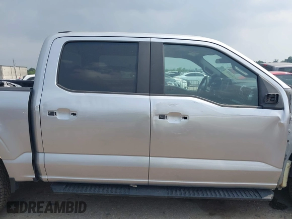 2022 Ford F-150 XL with VIN 1FTFW1E52NFA73233, listed as a IAAI auction lot 42311048 with 14,298 mi miles and . Bid and sale history available at DreamBid. Image 13.