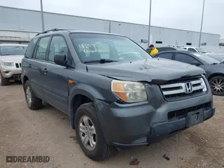 2007 Honda Pilot LX with VIN 5FNYF281X7B006877, listed as a IAAI auction lot 41595667 with 255,799 mi miles. Bid and sale history available at carsss.com. Image 1.