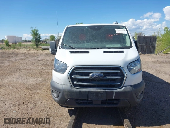 2020 Ford Transit Cargo with VIN 1FTBR2YGXLKB09134, listed as a IAAI auction lot 42117636 with 120,037 mi miles and . Bid and sale history available at DreamBid. Image 12.