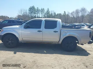 2011 Nissan Frontier PRO-4X with VIN 1N6AD0EVXBC407089, listed as a IAAI auction lot 42113537 with 124,853 mi miles. Bid and sale history available at carsss.com. Image 14.