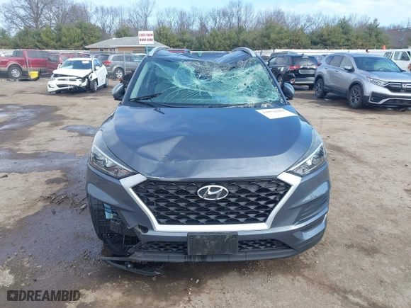 2019 Hyundai Tucson Value with VIN KM8J33A40KU999340, listed as a IAAI auction lot 41876380 with 52,752 mi miles. Bid and sale history available at carsss.com. Image 12.